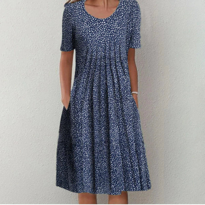 Stilvolles und lässiges Blumenkleid mit Taschen