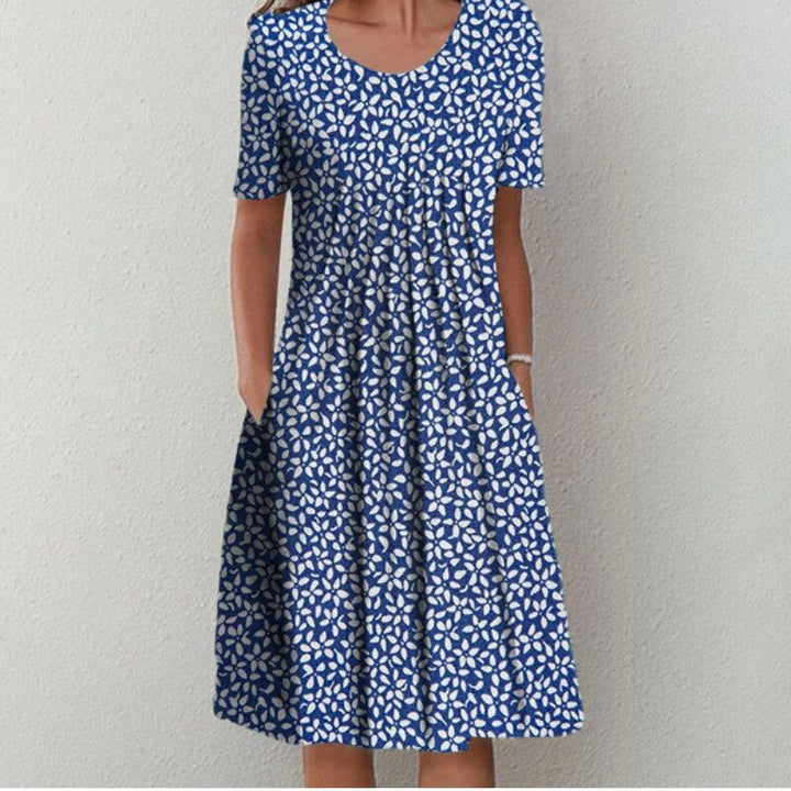 Stilvolles und lässiges Blumenkleid mit Taschen